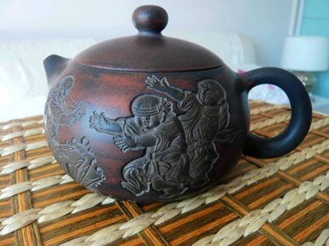 坭兴陶高浮雕童乐西施壶 坭兴陶高浮雕童乐西施壶